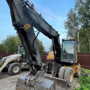 Колёсный экскаватор Volvo EW140, 2000